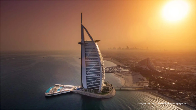 Stunning sunset behind Burj Al Arab, among Dubai’s most Instagrammable places.