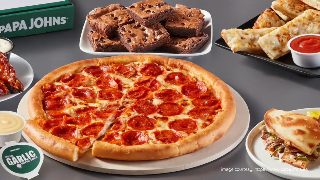 Papa John's pepperoni pizza with cheese sticks and chocolate brownies.