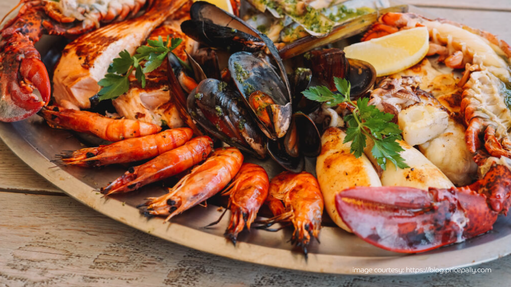 Delicious seafood platter featuring a variety of seafood with fresh vegetables.